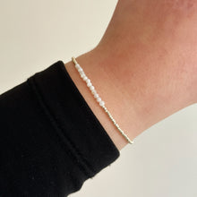 Load image into Gallery viewer, Delicate gold bracelet with natural shell beads
