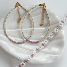 Load image into Gallery viewer, Gold bracelets with coloured accents (pinks, purples &amp; reds)
