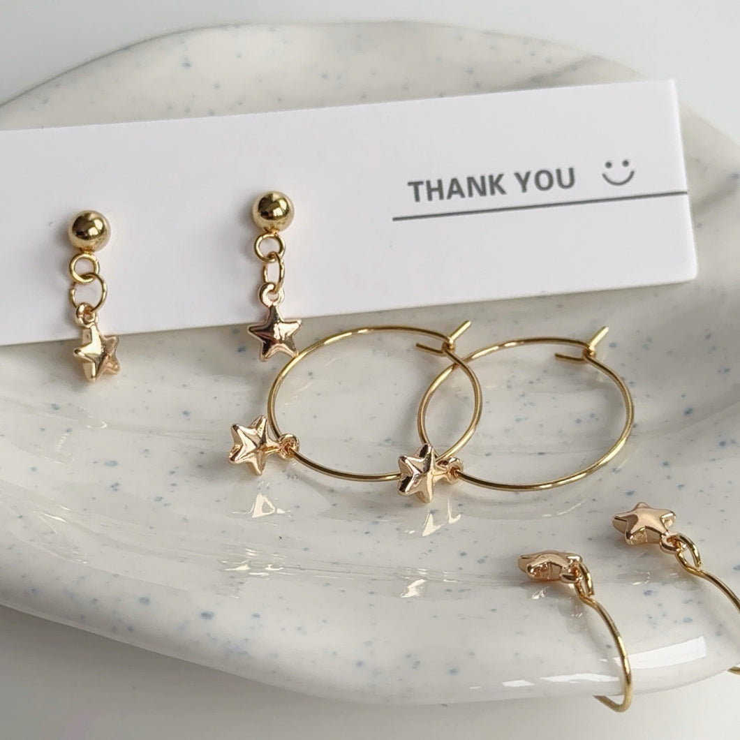 Gold star puff earrings