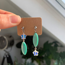 Load image into Gallery viewer, Aqua star dangly earrings
