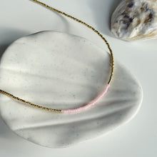 Load image into Gallery viewer, Gold and pink glass bead necklace
