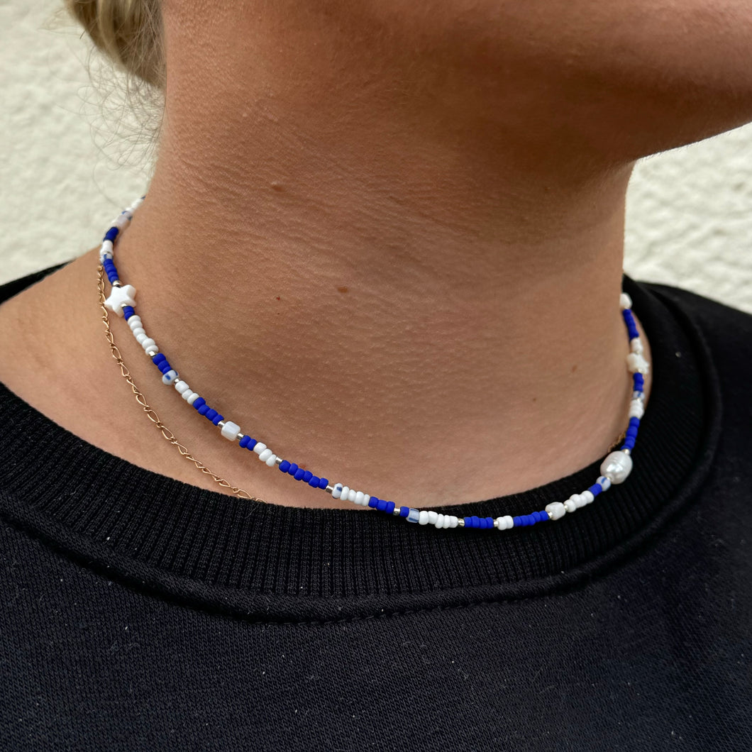 Royal blue, mother of pearl star glass bead necklace