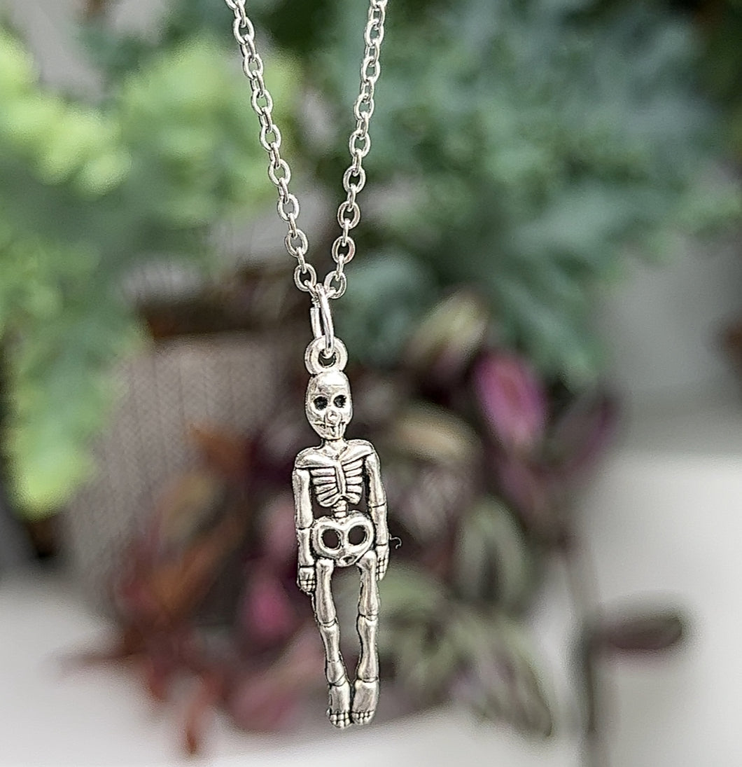 Skeleton charm necklace