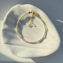 Load image into Gallery viewer, Gold bracelets with coloured accents (pinks, purples &amp; reds)
