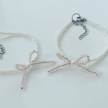 Load image into Gallery viewer, Iridescent pink bow bead bracelet
