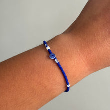 Load image into Gallery viewer, Pinstripe swirl and mother of pearl glass bead bracelet
